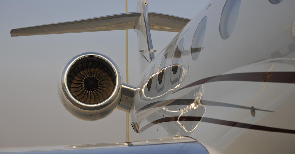 Side view of business jet looking toward engine and tail