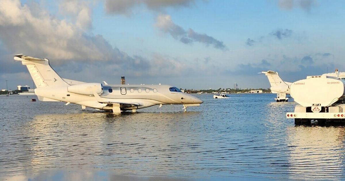 Private jets sitting on flooded ramp at Fort Lauderdale/Hollywood International Airport 