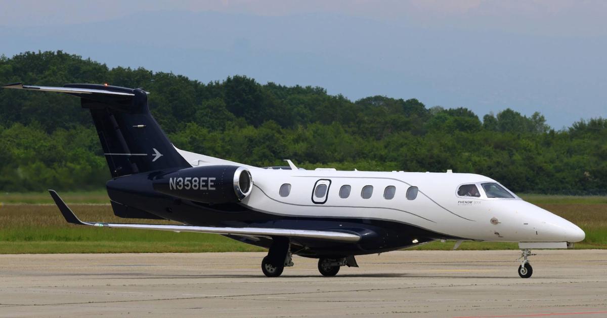 Embraer Phenom 300 on airport taxiway