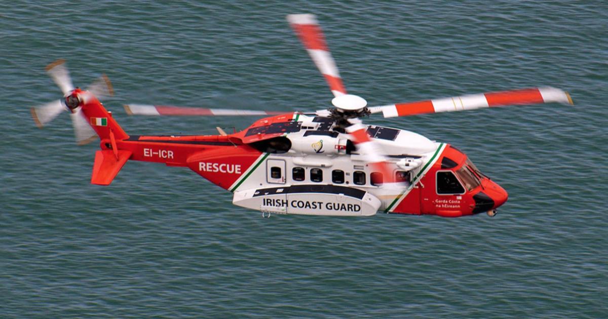 Irish Coast Guard search and rescue helicopter in flight over ocean