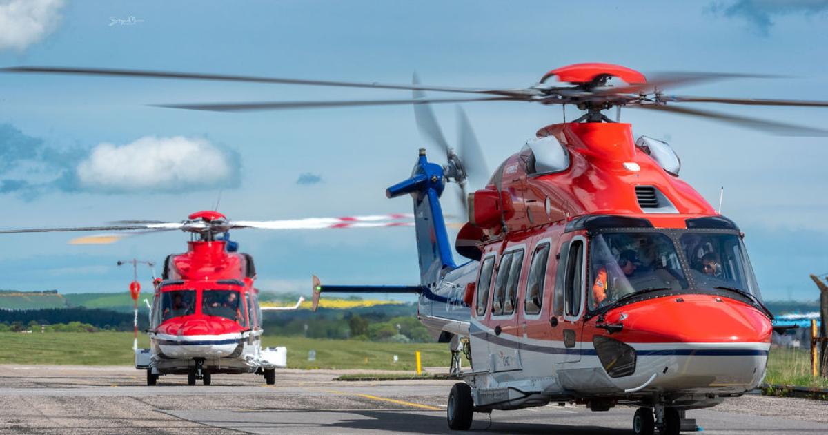 CHC H175 helicopters on airport ramp