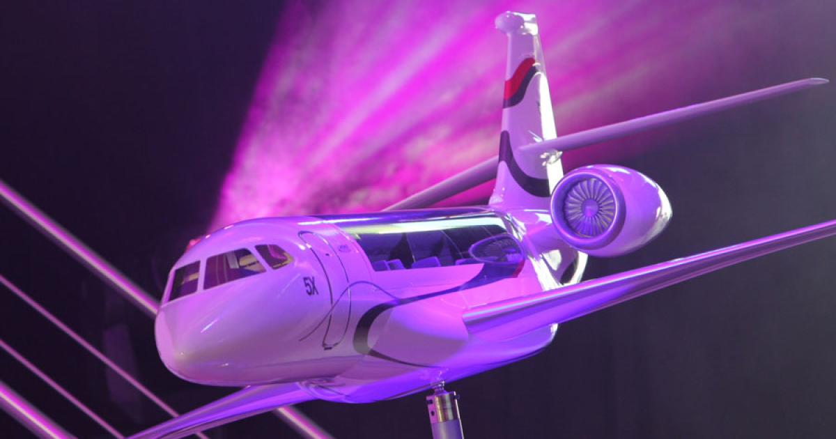 Dassault patriarch Serge Dassault and former chairman and CEO Charles Edelstenne were on hand to perform the unveiling honors, as the company finally revealed its long-awaited super midsize Falcon 5X. (Photo: Mariano Rosales)