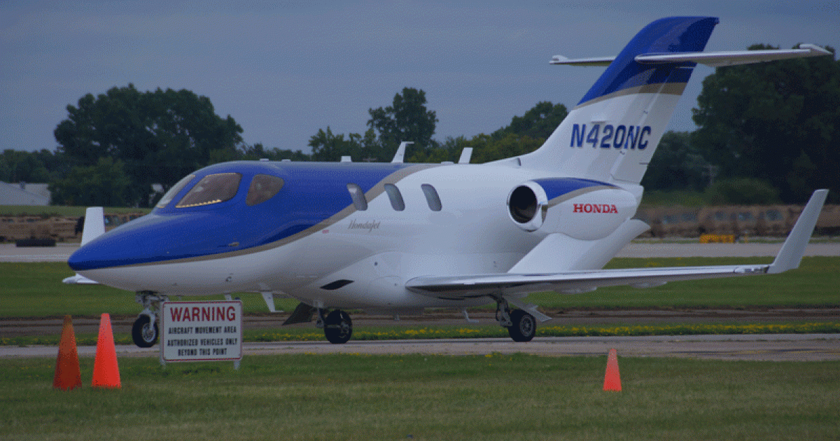 One of two HondaJets to arrive on Sunday, July 28 for the first public appearance of the FAA-conforming version of the unique jet.