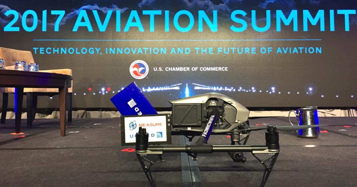 The DJI Inspire 2 quadcopter rests on the stage at the U.S. Chamber of Commerce Aviation Summit. (Photo: Measure via Twitter)